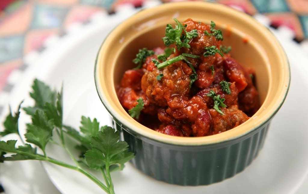 Close up of chili with parsley on top
