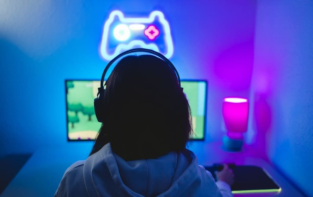 Kid playing video games