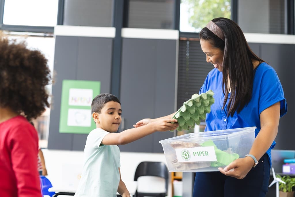 PTO member interacting with student during fundraising event