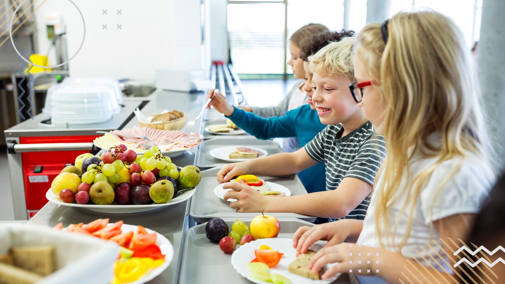 School children lined up with plates in front of a concessions snack spread at the school cafeteria.