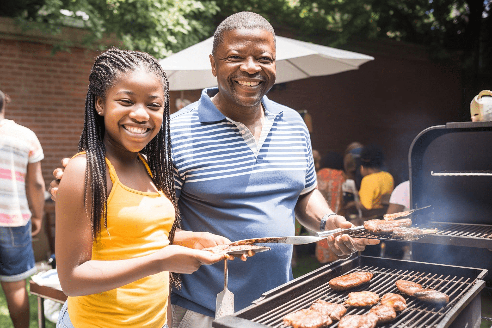 Family grilling at a summer BBQ fundraiser
