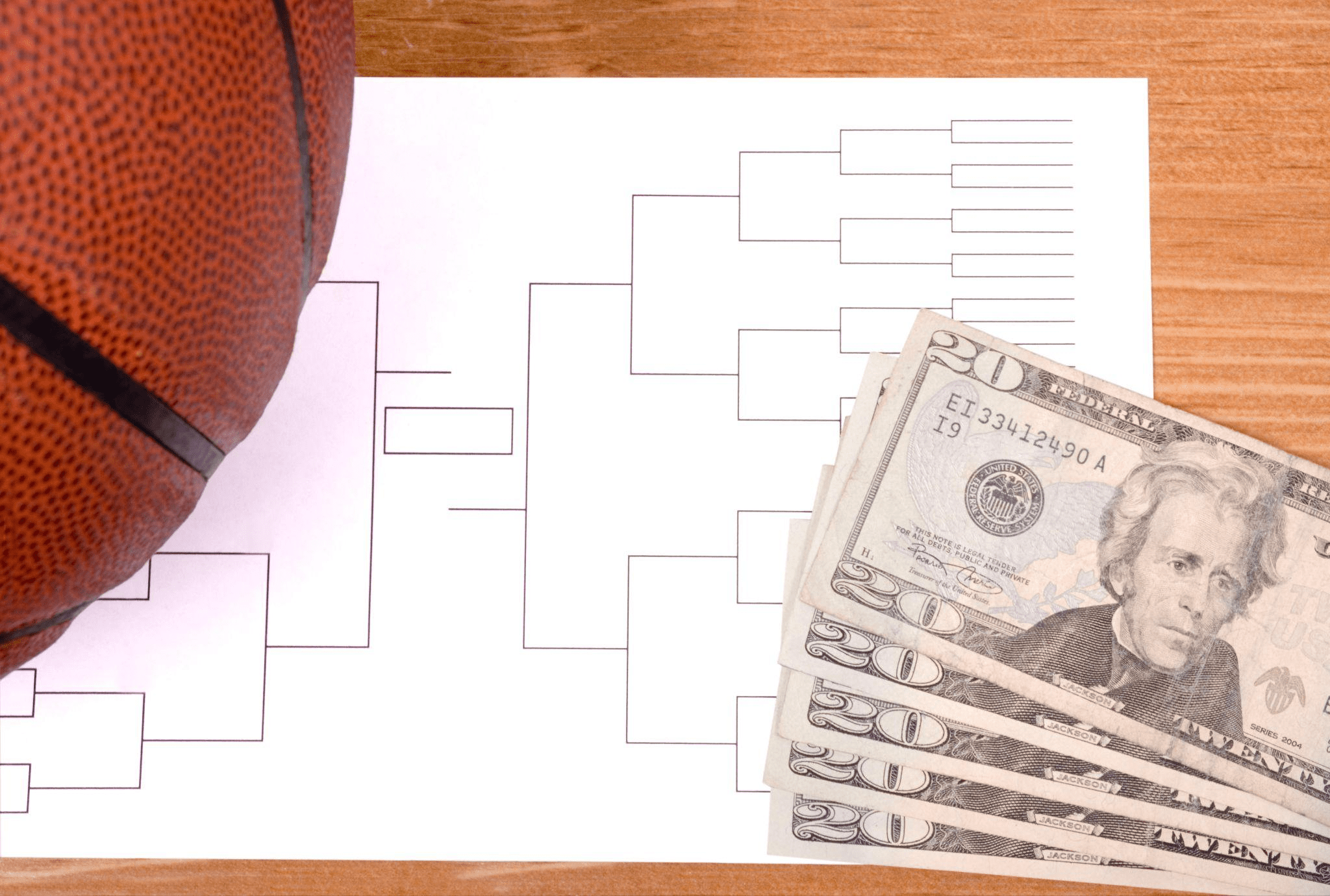 Basketball bracket and cash for sports fundraising