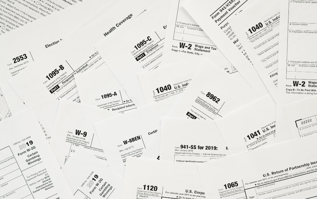 A pile of various IRS tax forms.
